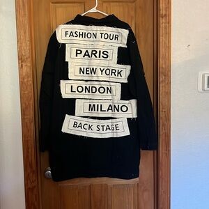 Distressed long black denim jacket.  New.  Size 5X fits like 3X.